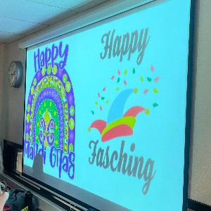 Display that says "Happy Mardi Gras" and "Happy Fasching"